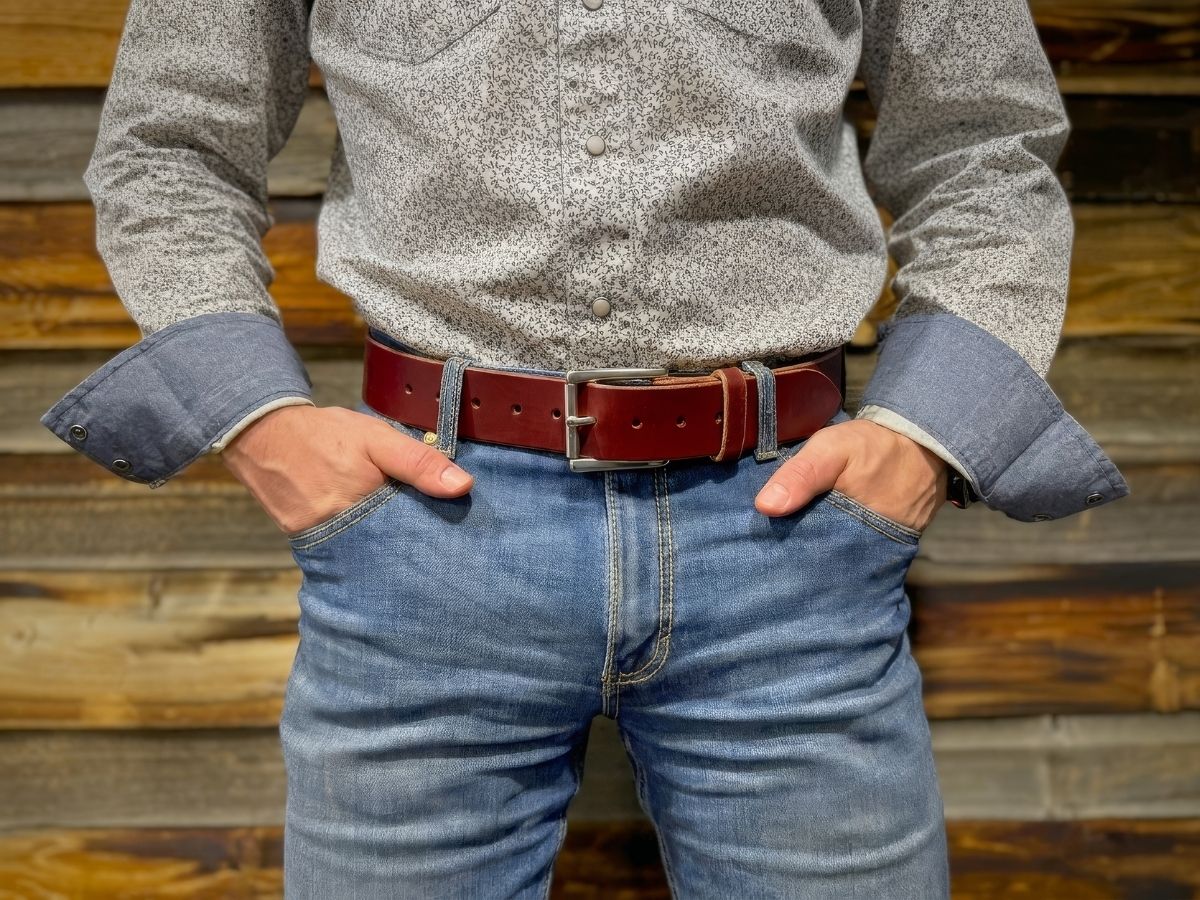 Chestnut leather work belt worn by tradesman on job site — The Man Belt built to last a lifetime, handcrafted in Northern Alberta Canada - Stewart Leather