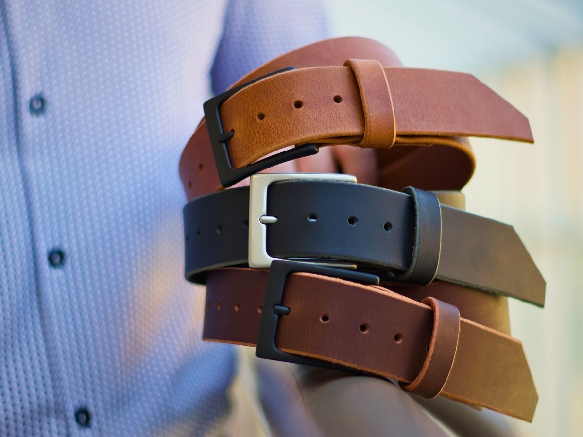 Cognac mens leather dress belt close up — rare full-grain Water Buffalo hide develops a patina unique to you, handcrafted by Stewart Leather in Alberta Canada