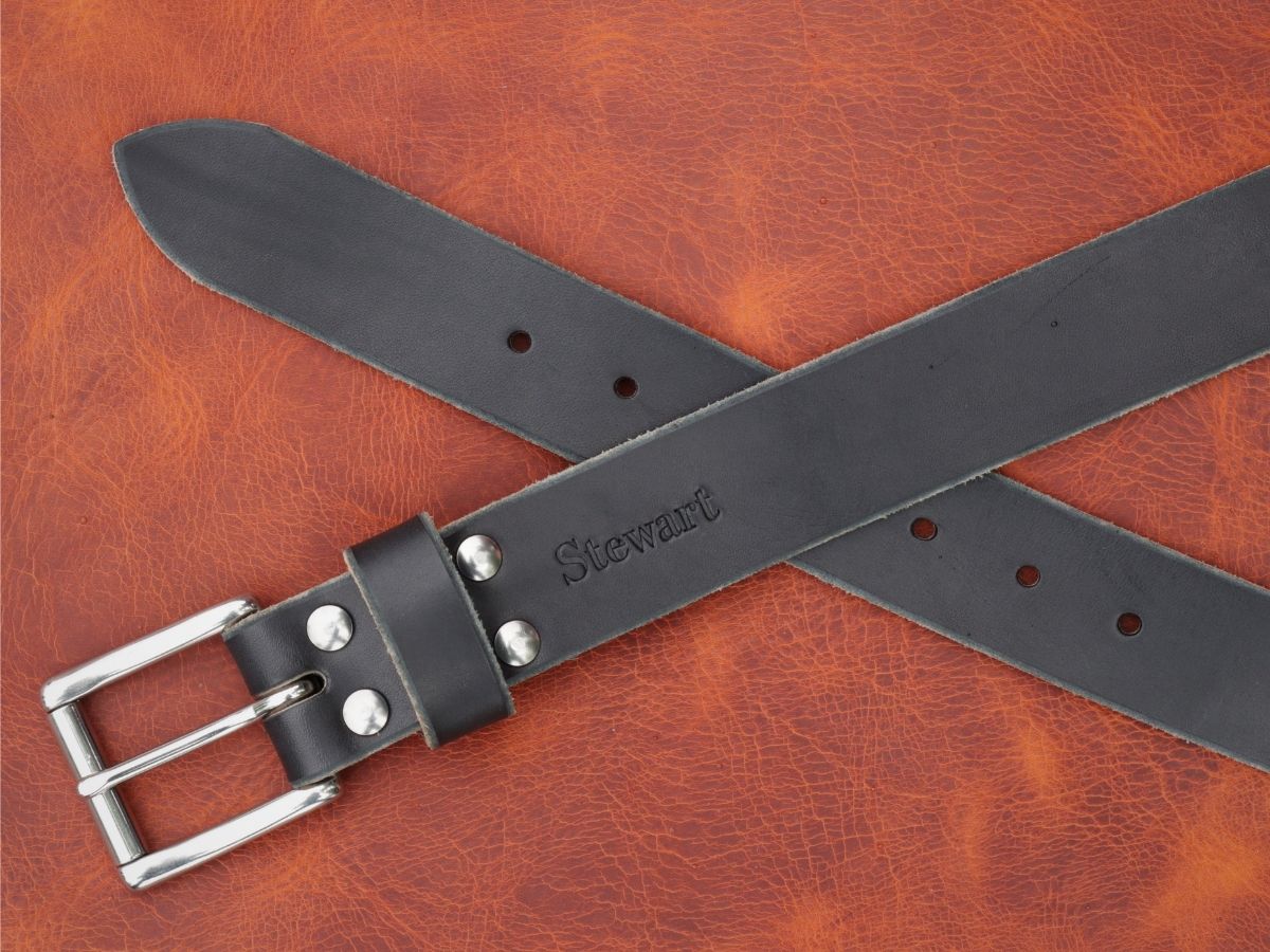 Black Heritage Belt buckle detail — stainless interchangeable buckle with 4 Chicago screws, 1.5 inch full-grain leather belt made in Alberta - Stewart Leather
