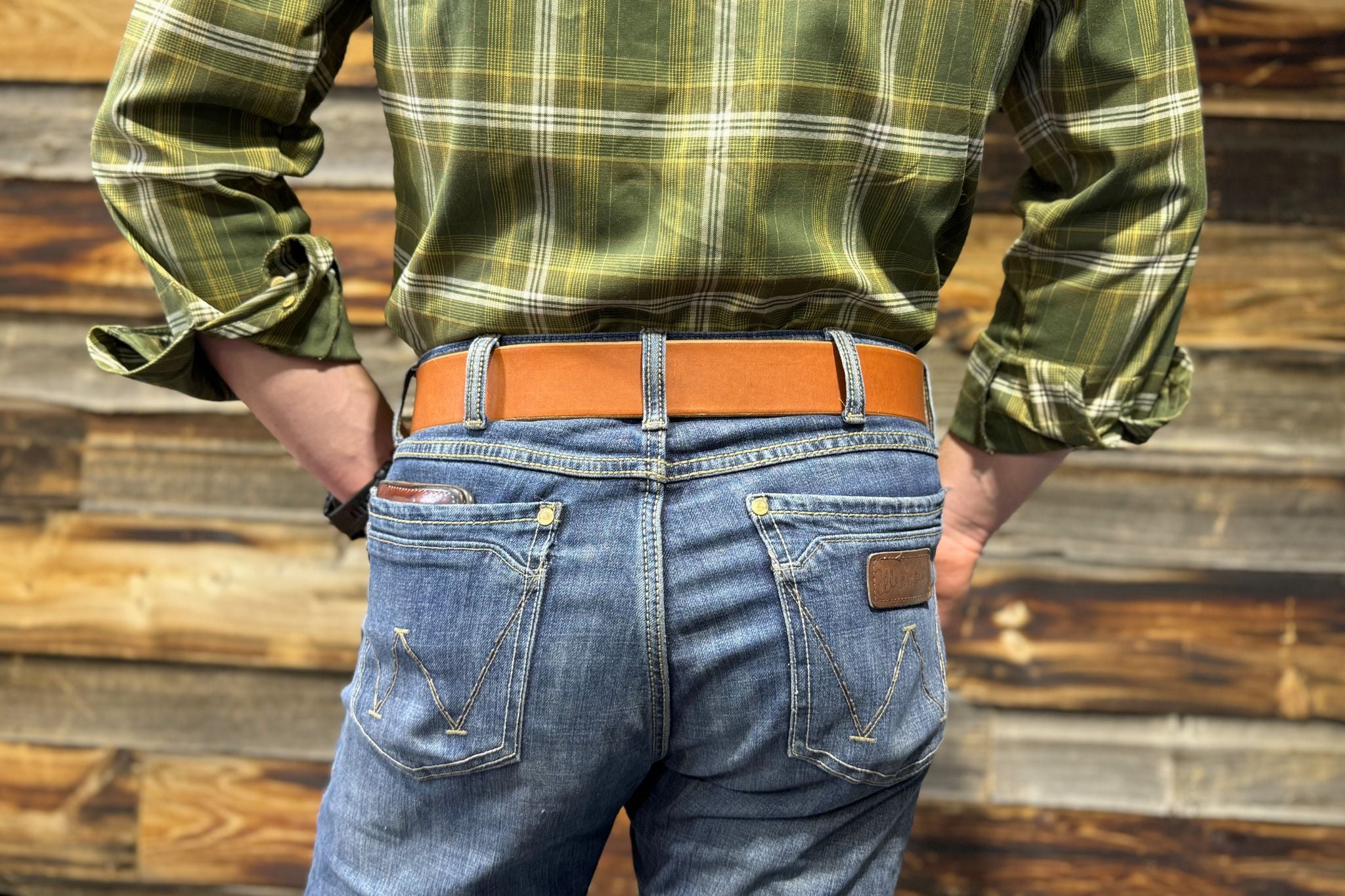 Heavy duty saddle tan leather belt that won't twist or fold under hard work — made in Northern Alberta Canada - Stewart Leather