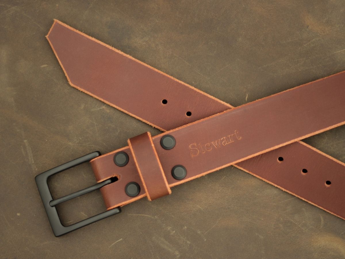 Espresso mens leather dress belt buckle detail — solid brass interchangeable buckle with 4 brass Chicago screws, full-grain Water Buffalo hide made in Alberta - Stewart Leather