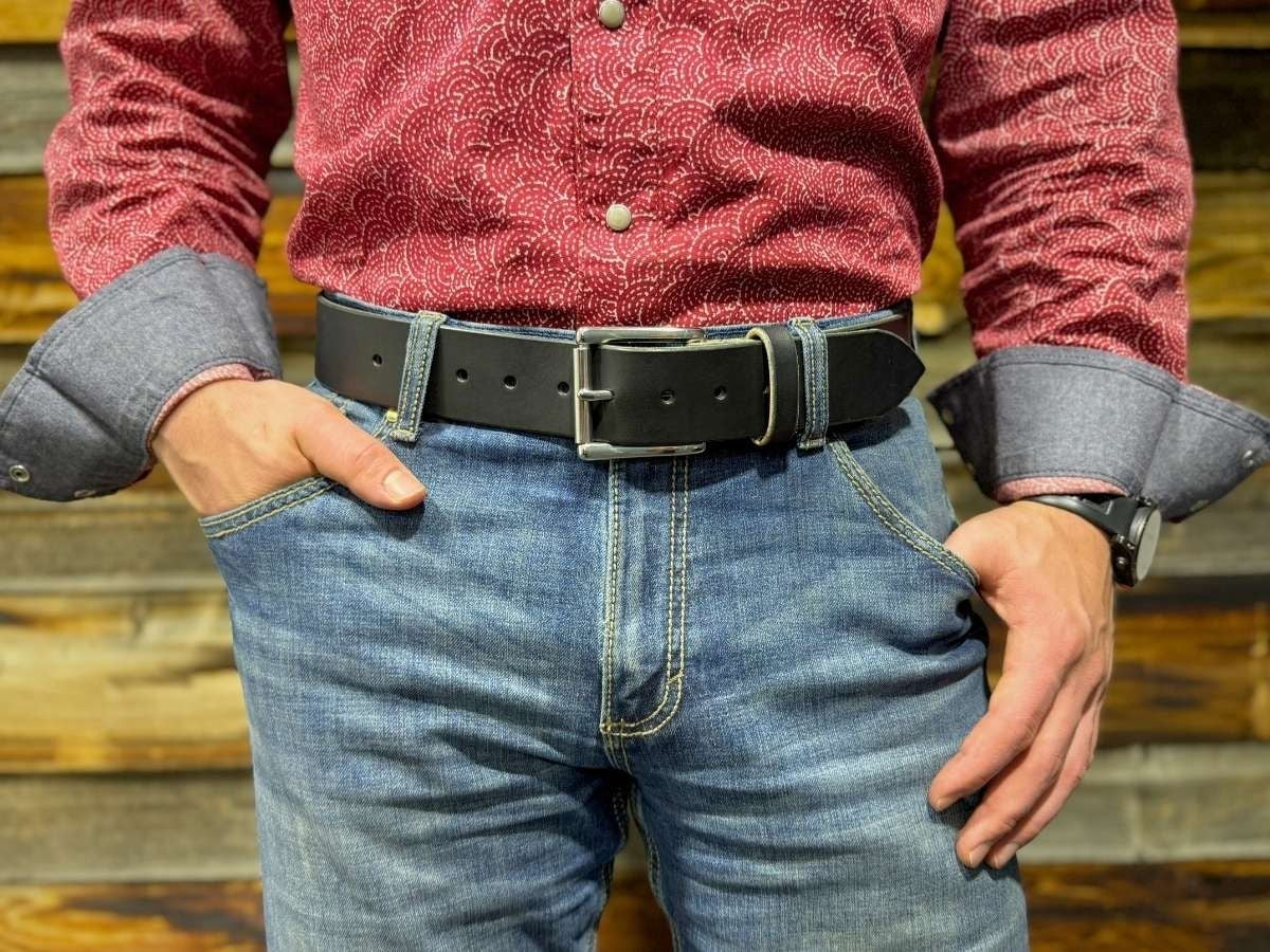Black leather work belt worn on the job — The Man Belt 1¾ inch full-grain English bridle hide, built for blue collar men, handcrafted in Northern Alberta - Stewart Leather