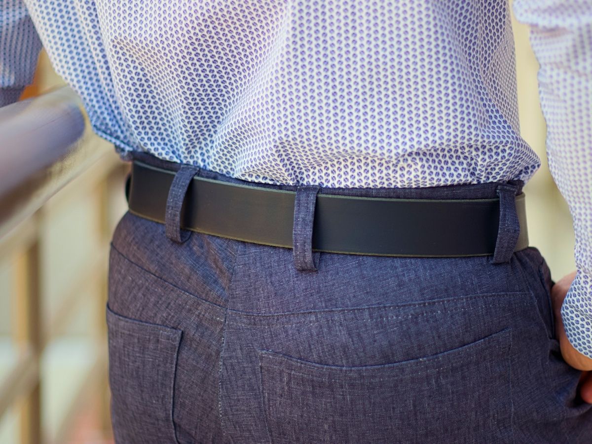 Side view of black Water Buffalo leather mens dress belt — 1.5 inch sharp clean fit for dress pants, buy once wear for life, made in Alberta - Stewart Leather
