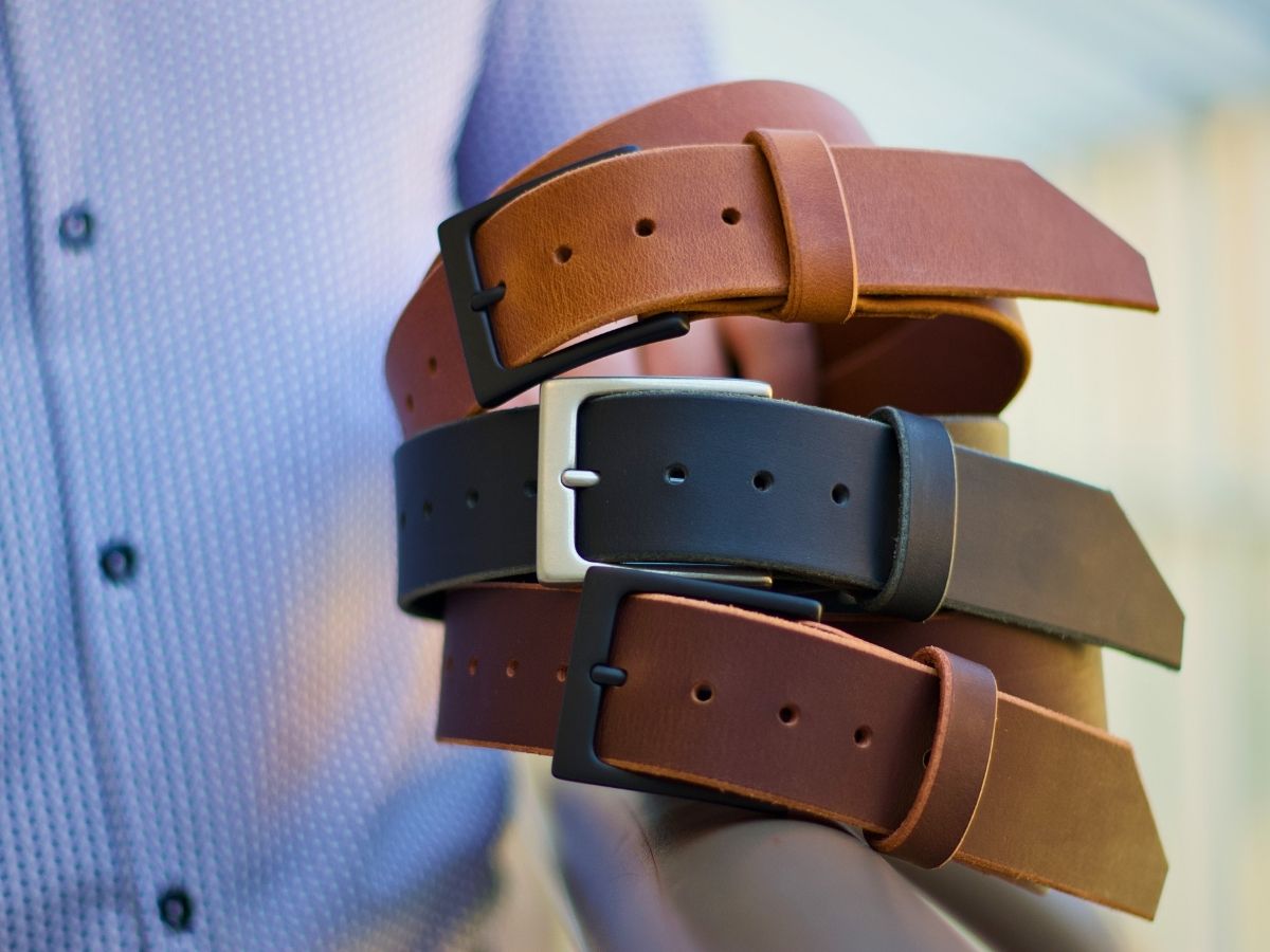 Espresso mens leather dress belt close up — rare full-grain Water Buffalo hide develops a patina unique to you, handcrafted by Stewart Leather in Alberta Canada