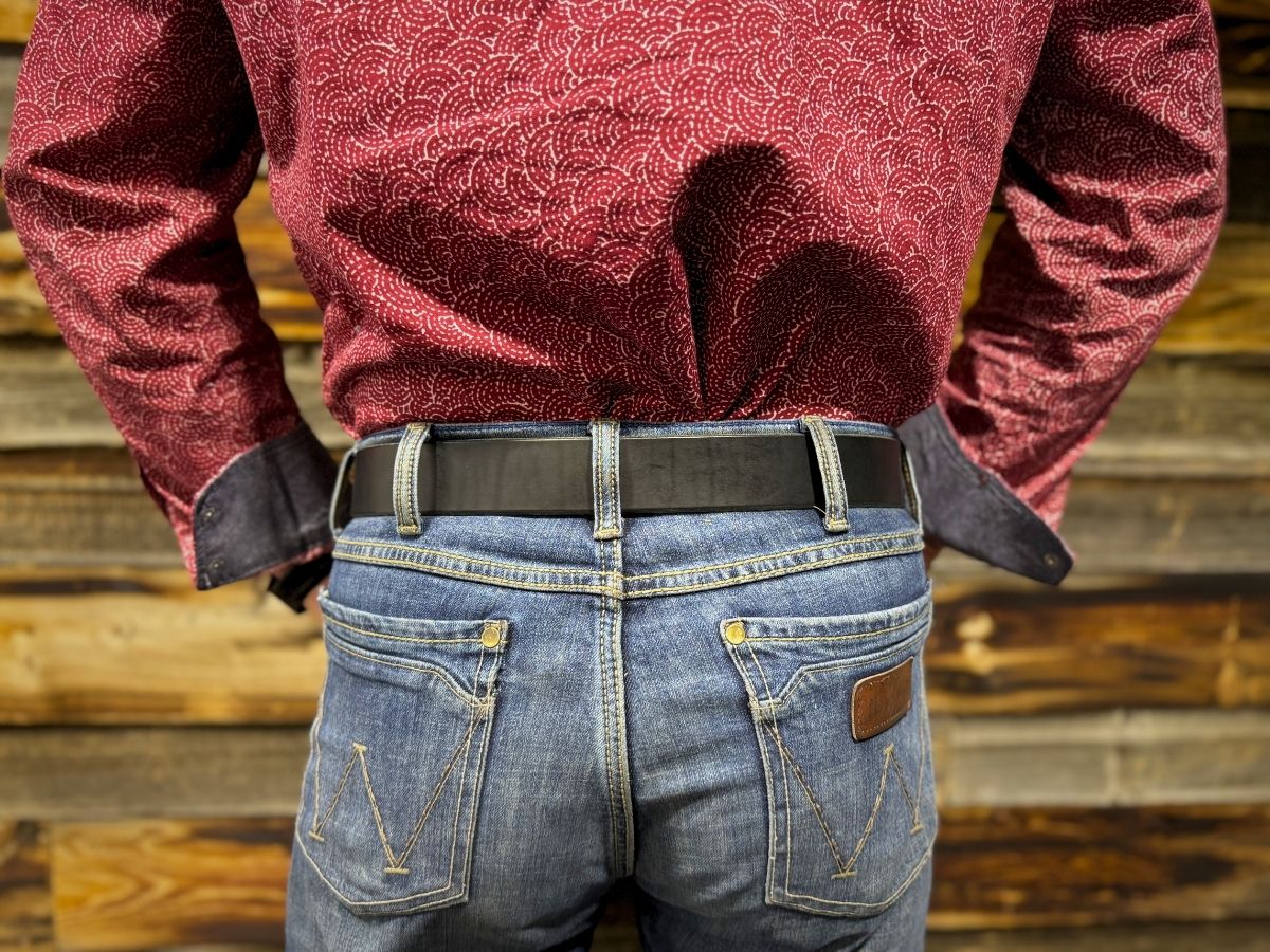 Side view of black 1.5 inch leather work belt on jeans — The Heritage Belt built for blue collar men, buy once wear for life, handcrafted in Alberta - Stewart Leather