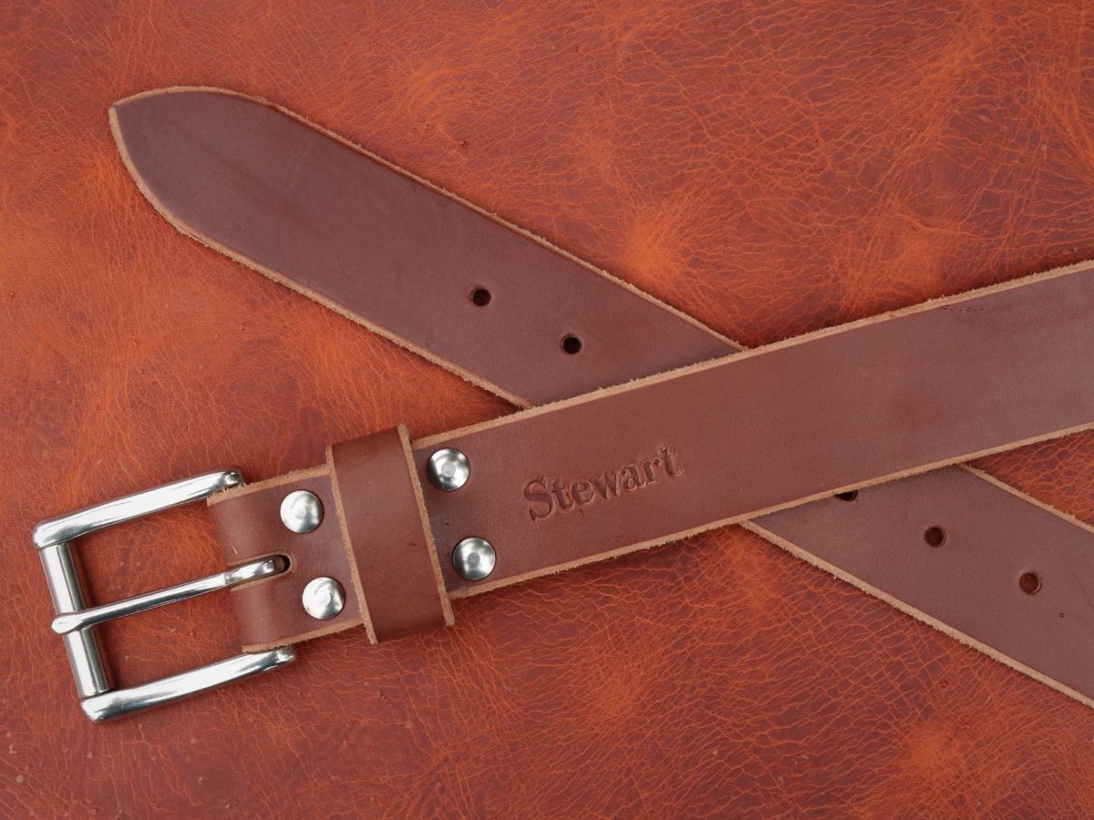 Rich brown Heritage Belt buckle detail — stainless interchangeable buckle with 4 Chicago screws, 1.5 inch full-grain leather belt made in Alberta - Stewart Leather
